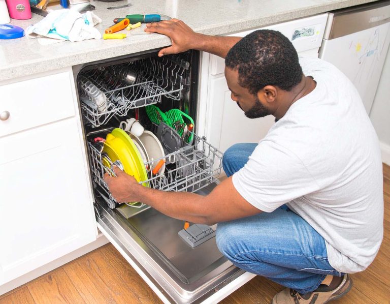 Photo-realistic close-up of a male repairman fixing a dishwasher